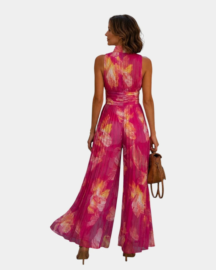 Shana | Tuta plissettata in chiffon floreale fucsia