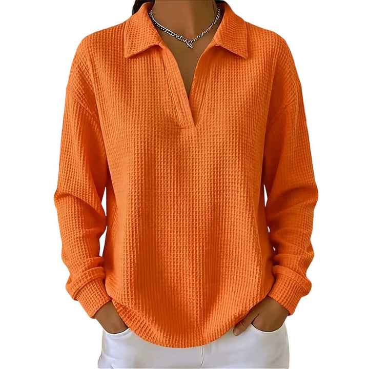 Blusa donna a maniche lunghe con scollo a V in tessuto strutturato