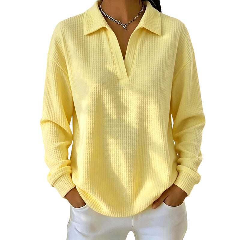 Blusa donna a maniche lunghe con scollo a V in tessuto strutturato