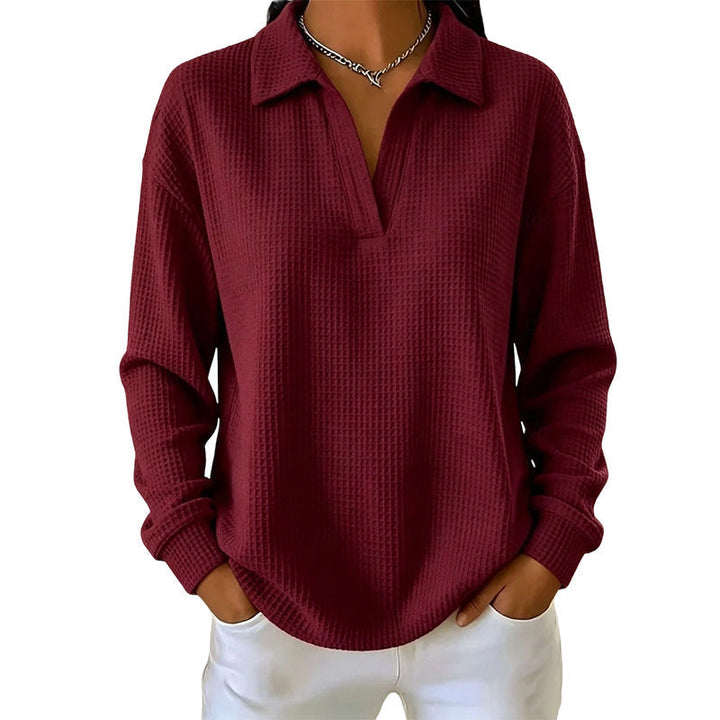 Blusa donna a maniche lunghe con scollo a V in tessuto strutturato
