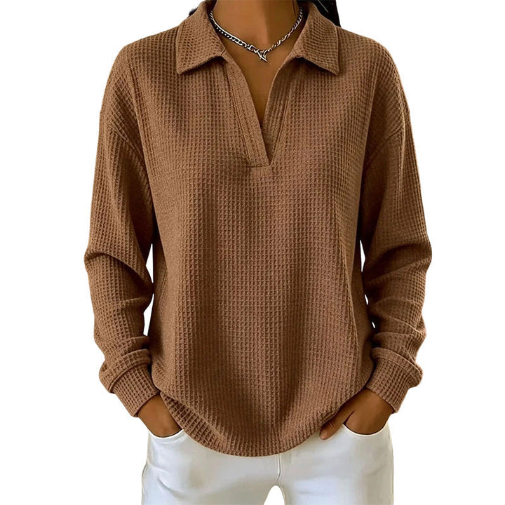 Blusa donna a maniche lunghe con scollo a V in tessuto strutturato