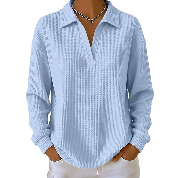 Blusa donna a maniche lunghe con scollo a V in tessuto strutturato